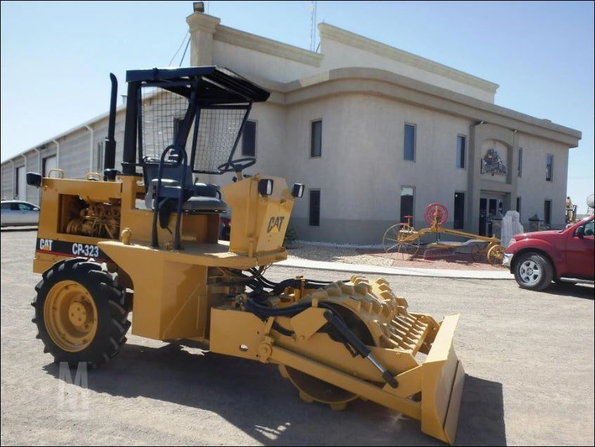 CATALOGO DE PEÇAS CATERPILLAR - CP-323 - ROLO COMPACTADOR VIBRATÓRIO EM PDF