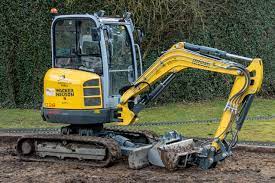 MANUAL DE OPERAÇÃO ESCAVADEIRA DE ESTEIRA WACKER NEUSON - EZ28